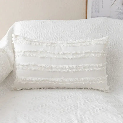 White rectangular pillow cover with yellow and cream daisy floral embroidery and frayed fabric trim decorbites daisy floral decor
