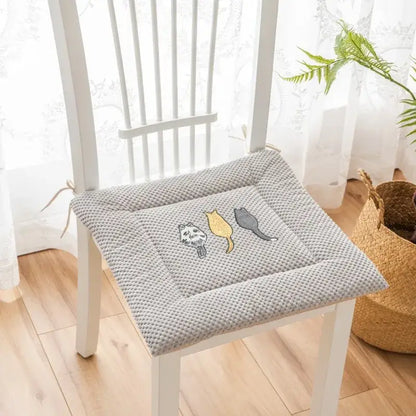 Gray textured seat cushion with yellow white and gray cartoon embroidered cat designs for dining room decorbites seat cushions