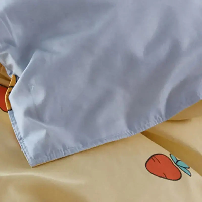 Light blue pillowcase with a soft fabric texture in yellow and light blue decorbites cartoon printed bedding set