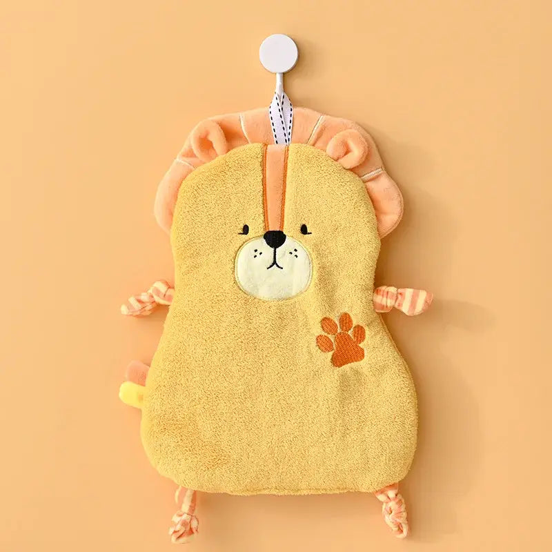 Yellow plush lion-shaped hand towel with orange accents and embroidered features for decorbites cartoon animal decor