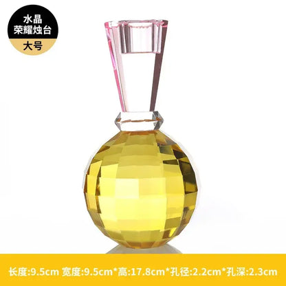 Yellow and pink faceted crystal candle holder with translucent yellow cup and pink clear glass stem for dining room centerpiece