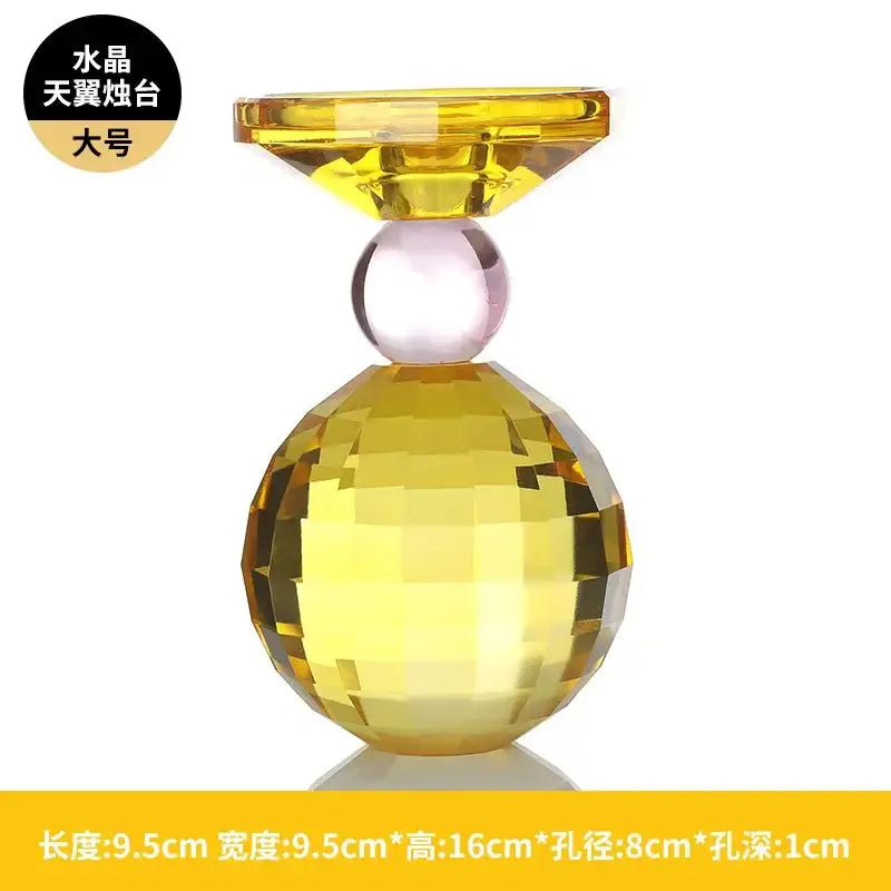 Yellow and pink crystal candle holder with faceted spherical base and diamond top for dining room centerpiece