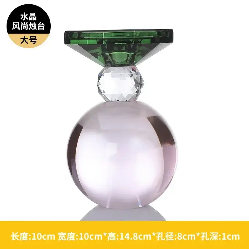 A sleek translucent lavender crystal candle holder with a faceted gemstone and green tinted top for dining room centerpiece