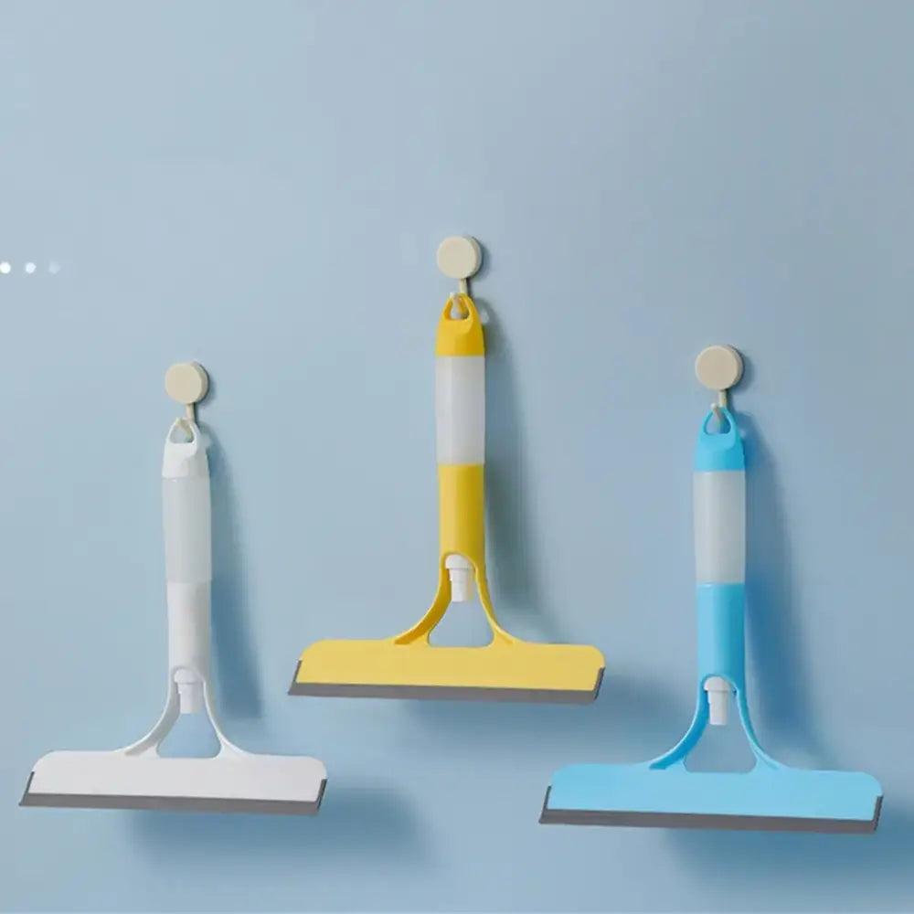 Yellow and white glass cleaning brush squeegee with colorful rubber blades mounted on adhesive hooks for bathroom tiles decorbites glass cleaning