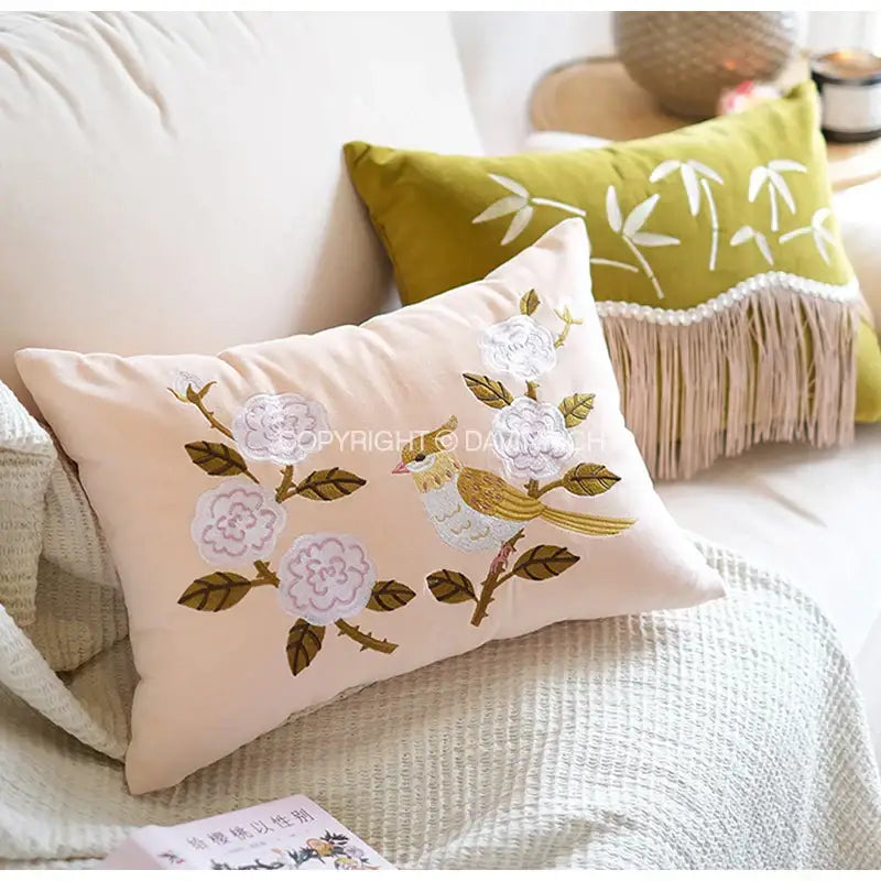 Beige rectangular yellow bamboo velvet throw pillow cover with embroidered white flowers green leaves and yellow bird
