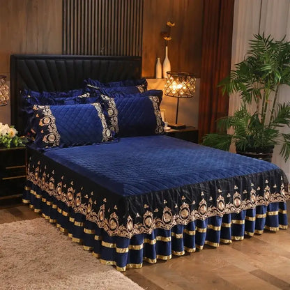 Deep blue velvet bedspread with gold and black ornate embroidery along ruffled edge in decorbites crystal velvet bedspread set