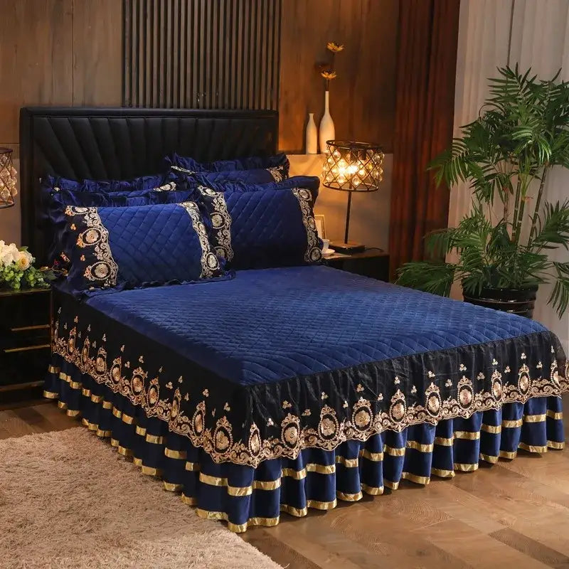 Deep blue velvet bedspread with gold and black ornate embroidery along ruffled edge in decorbites crystal velvet bedspread set