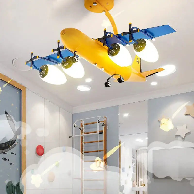 Yellow and blue airplane bluetooth speaker lamp with green propellers and black wheels for kids room decorbites decor
