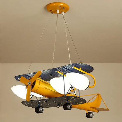 Vibrant yellow and blue vintage biplane bluetooth speaker lamp with white illuminated wings for kids room decorbites