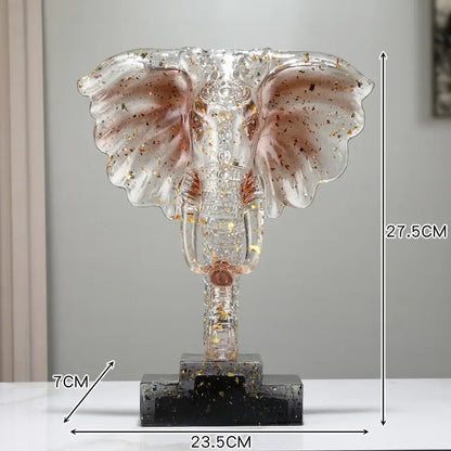 Transparent glass elephant sculpture with gold leaf accents on black marble base for home decor by decorbites crystal elephant