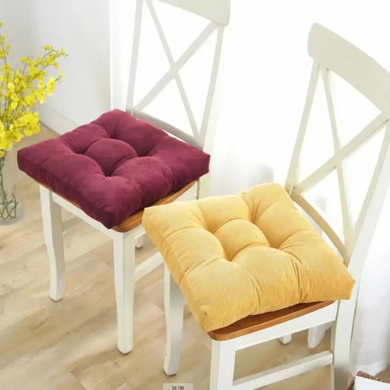 Two square velvet tufted chair cushions in burgundy and mustard yellow perfect for inyahome square floor pillow decorbites inyahome square