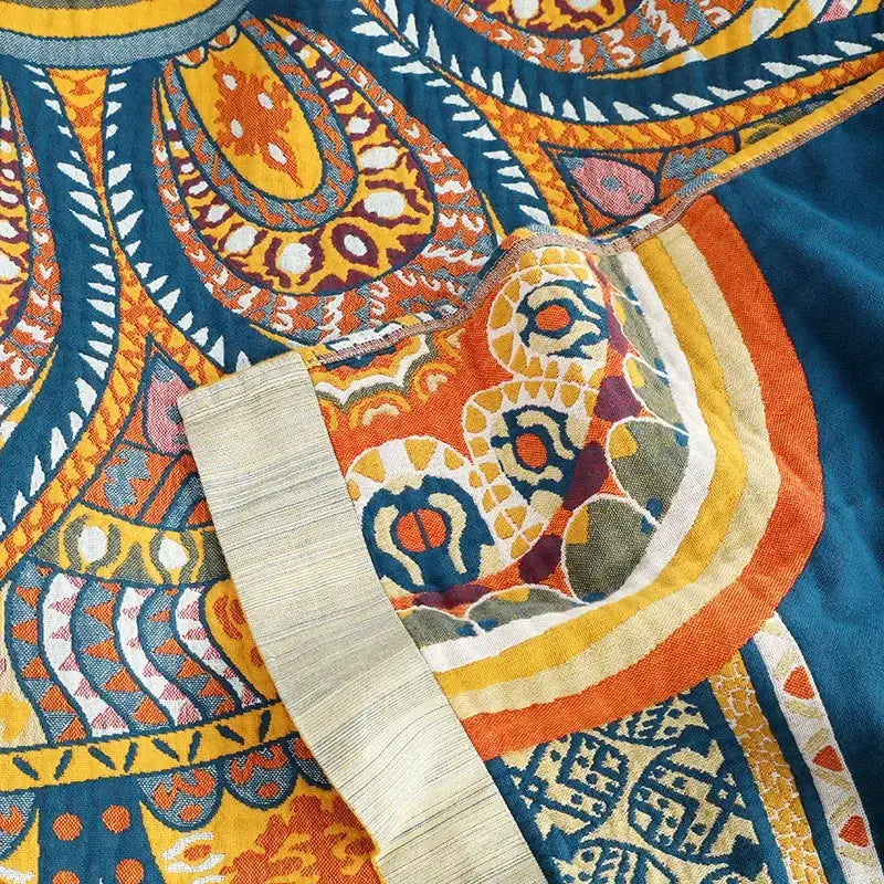 Yellow cotton mandala leisure blanket with vibrant teal orange paisley fabric and textured beige trim decorbites cotton mandala