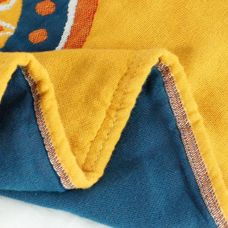 Yellow cotton mandala leisure blanket with vibrant yellow and teal knit featuring playful orange dots for decorbites cotton mandala decor