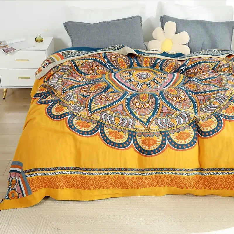 Vibrant yellow cotton mandala leisure blanket with colorful orange blue and pink intricate decorbites cotton mandala design