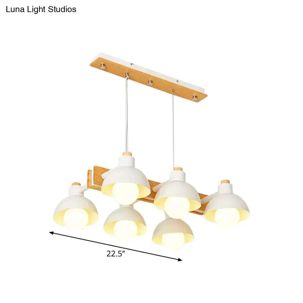 Modern farmhouse dome shade linear chandelier with five white ceramic lampshades on wood and matte white frame with chain cord length adjustments
