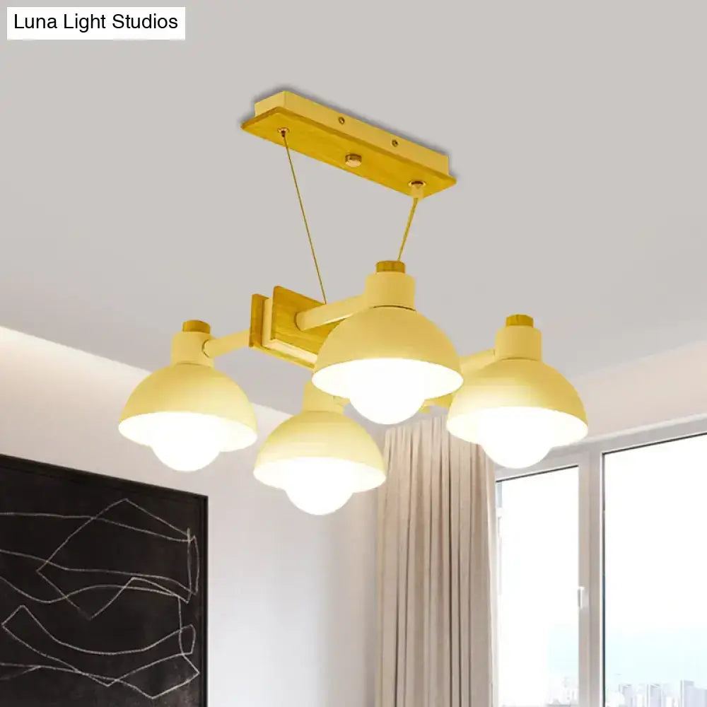 Yellow decorbites dome shade linear chandelier with four metal dome shades and rectangular mount for kitchen island lighting