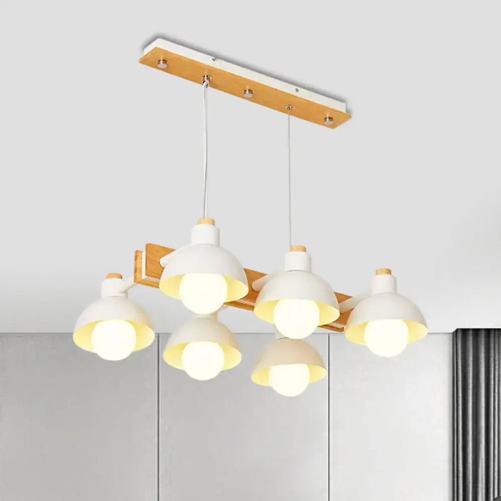 Decorbites dome shade linear chandelier with five white ceramic lampshades and chain cord length suspended from wood beam