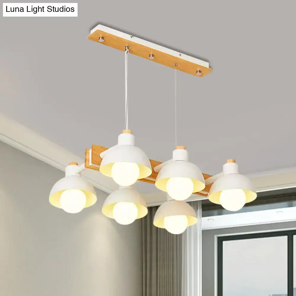 Modern white ceramic dome shade linear chandelier with wooden accents and adjustable chain cord length for island lighting
