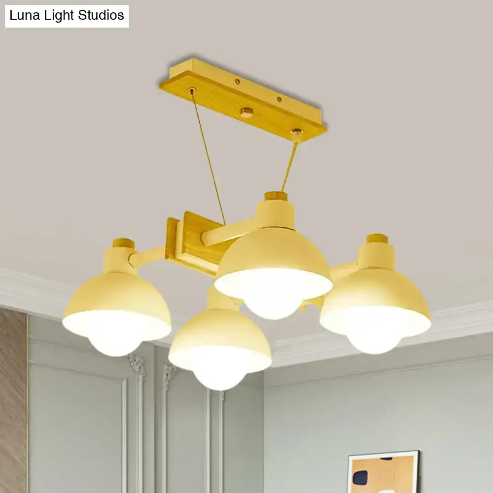Yellow metal decorbites dome shade linear chandelier with four dome-shaped lampshades and adjustable chain cord length