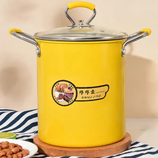 Yellow enamel deep fryer with glass lid and silver handles featuring a circular label decorbites deep fryer