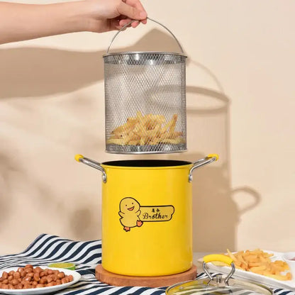 Yellow brother decorbites deep fryer with yellow enamel exterior, glass lid, mesh basket handle, and black interior pot