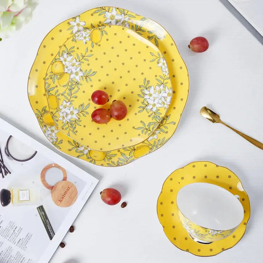 Vibrant yellow lemon tree bone china plate with scalloped edges and floral lemon motif from decorbites lemon tree set