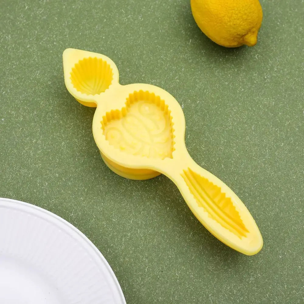 Yellow floral silicone biscuit cake mold with lemon and shell shapes featuring heart-shaped center for cake date pistachio decorbites biscuit cake