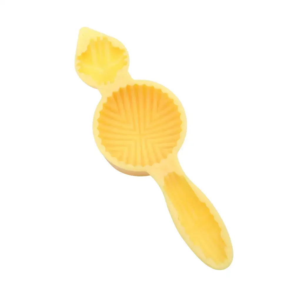 Yellow floral silicone biscuit cake date pistachio mold with leaf shaped top and scalloped grooves for cake date pistachio decorbites biscuit cake