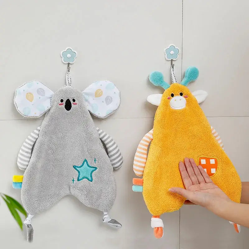 Yellow giraffe and gray koala plush hand towel hangers with embroidered details and striped arms by decorbites cartoon animals hand