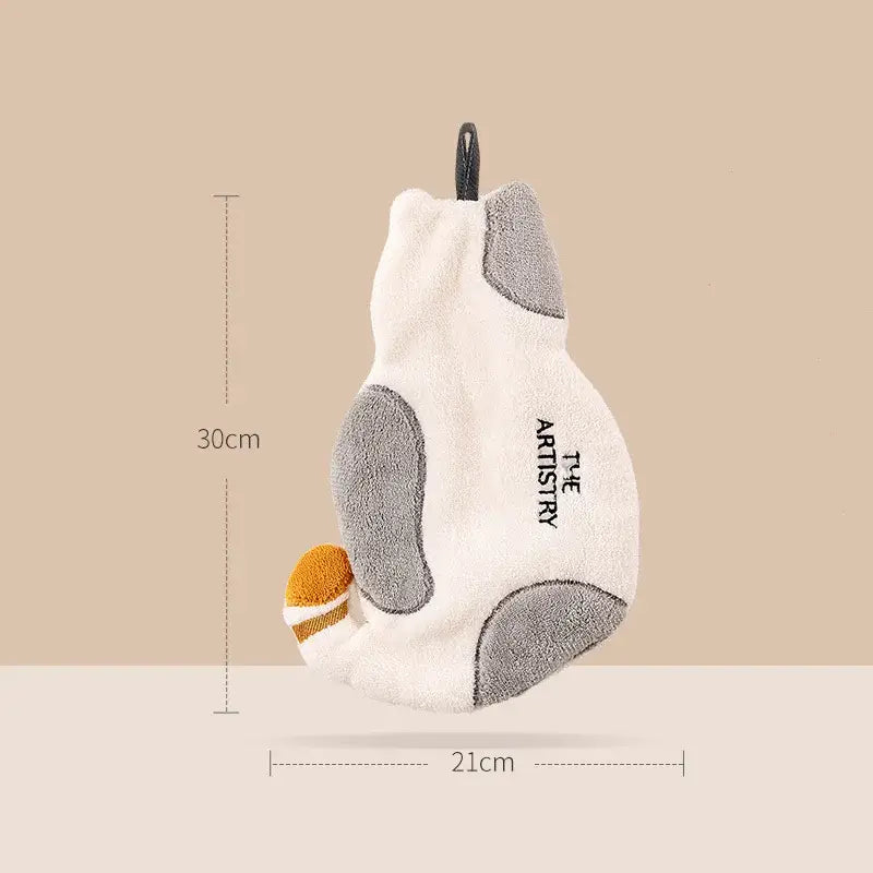 A soft plush cat-shaped cleaning mitt in white gray with tan tail tip paired with decorbites cartoon animals hand towel