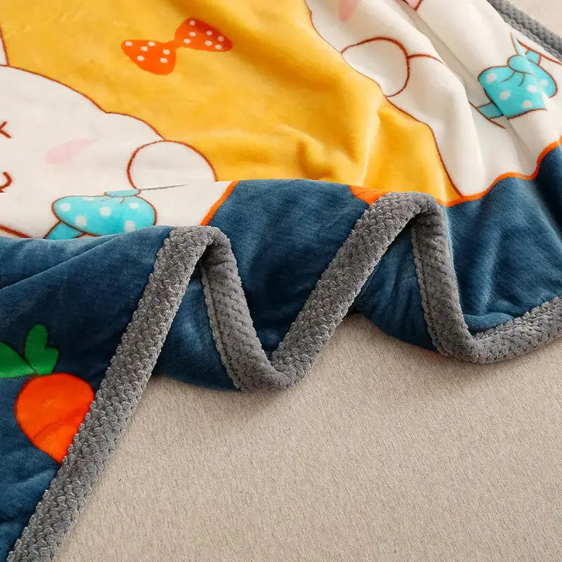 Yellow and gray bunny cartoon flannel blanket featuring white rabbits and colorful bows on a plush flannel throw by decorbites