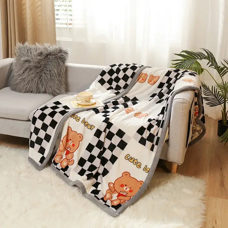 Yellow and gray bunny cartoon flannel blanket with white checkered pattern and brown bears featuring gray fleece border decorbites cartoon flannel