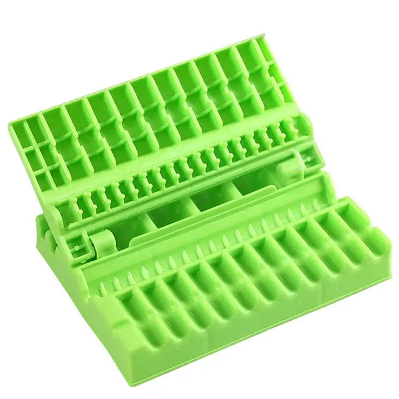 Bright green plastic meat skewer maker with grid slots and interlocking design for bbq meat kababs