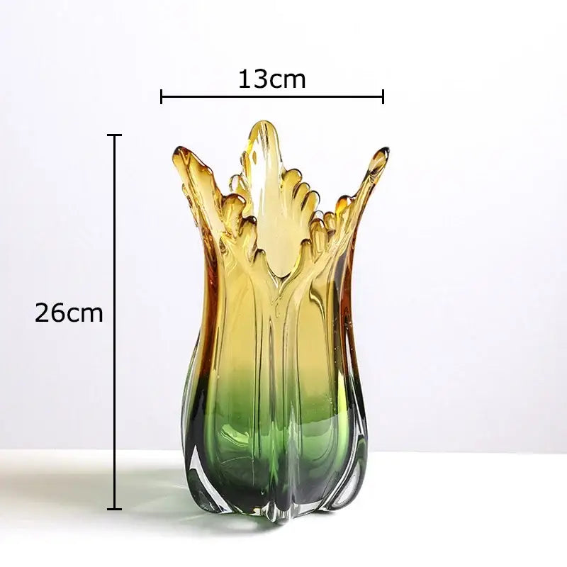 A tall slender green glass vase with amber gradient and leaf-like top for artificial flowers and glass vase hydroponics