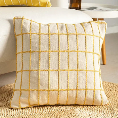 Cream-colored cushion cover with textured yellow grid pattern from decorbites cotton woven check collection for living room decor