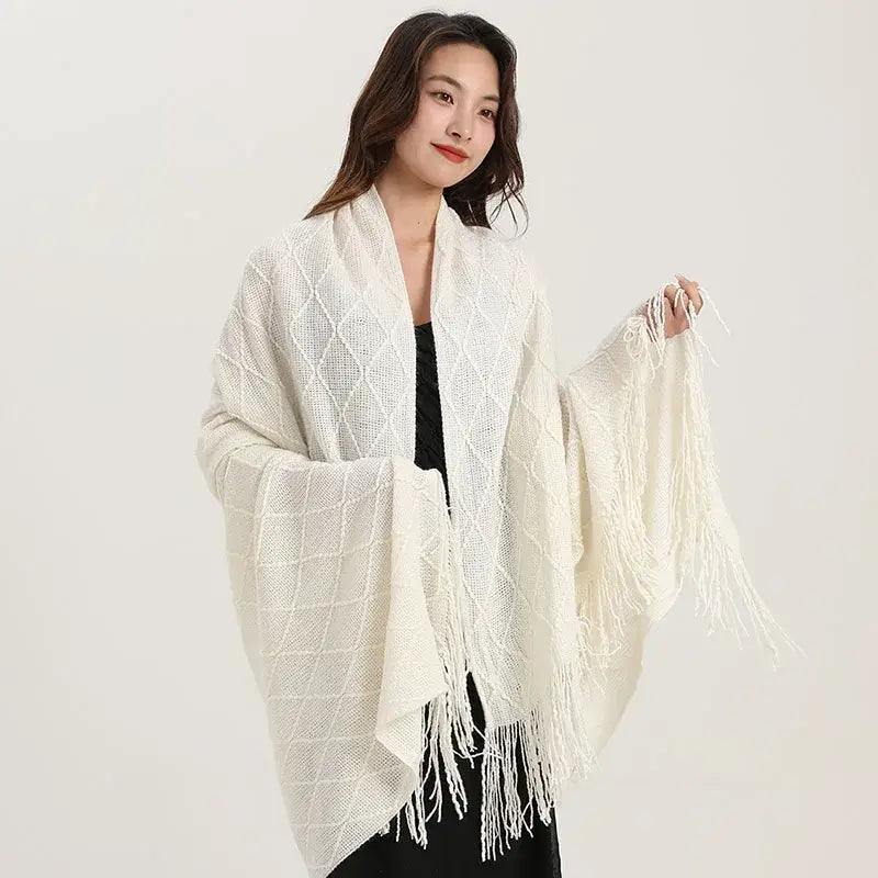 Cream-colored decorbites knitted diamond shawl wrap with fringe featuring a knitted diamond blanket pattern for bedroom decor
