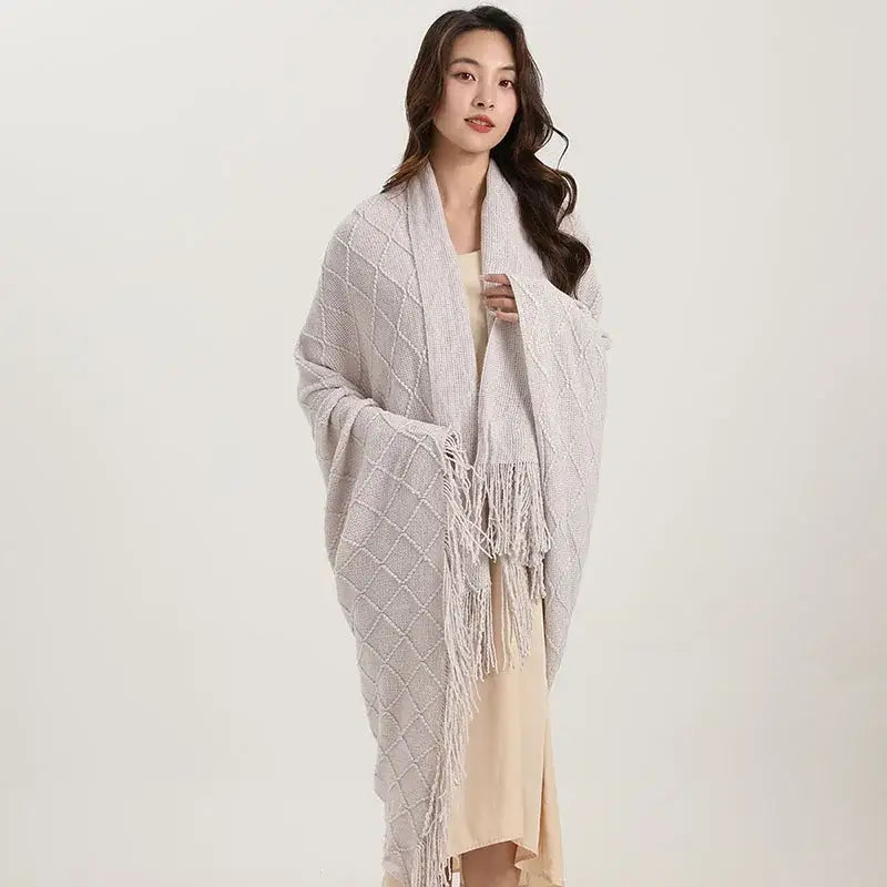 A soft light gray decorbites knitted diamond shawl wrap with fringe complements bedroom decorbites knitted diamond blanket