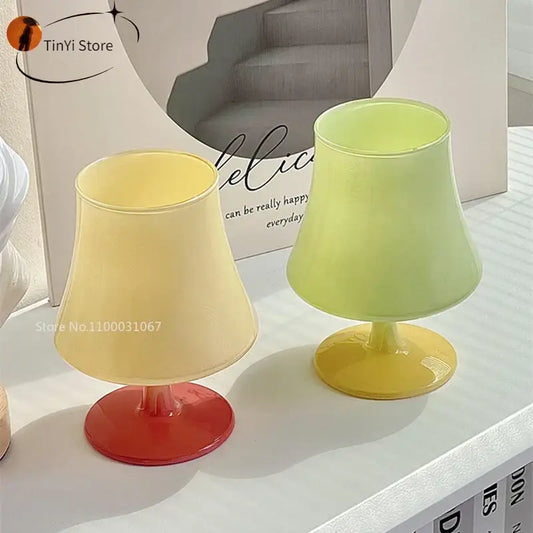 Pastel yellow and lime green translucent plastic lampshades with matching bases in decorbites gem champagne coupe dining room set