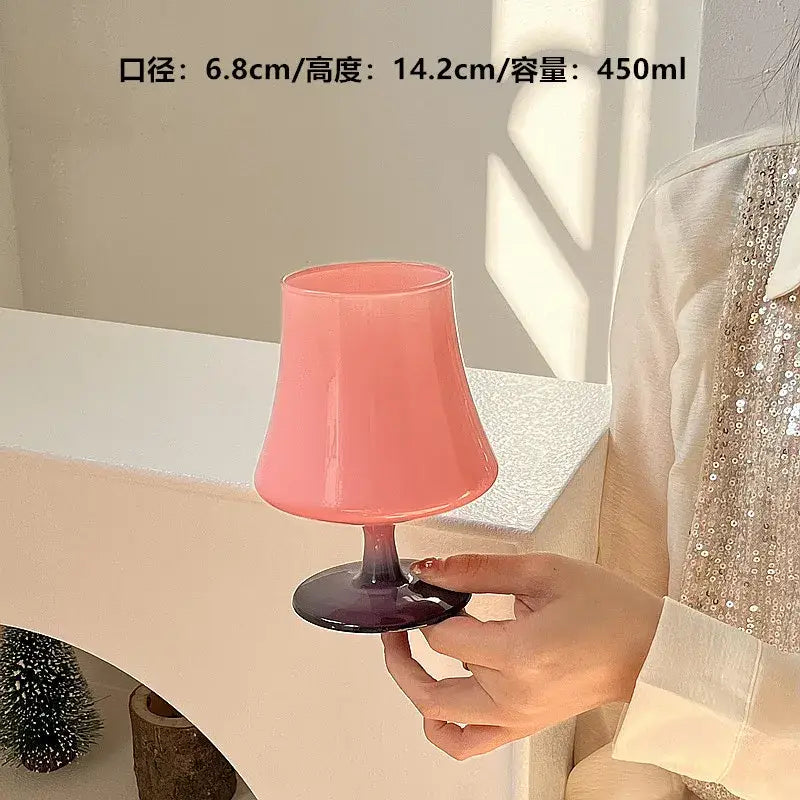 A pink and purple gradient glass gem champagne coupe with flared rim and slender stem from decorbites gem champagne set