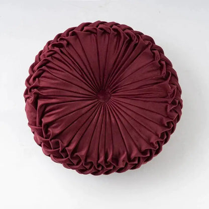 A plush deep burgundy velvet round throw pillow with a gathered pleated design for living room decorbites 3d pumpkin decor