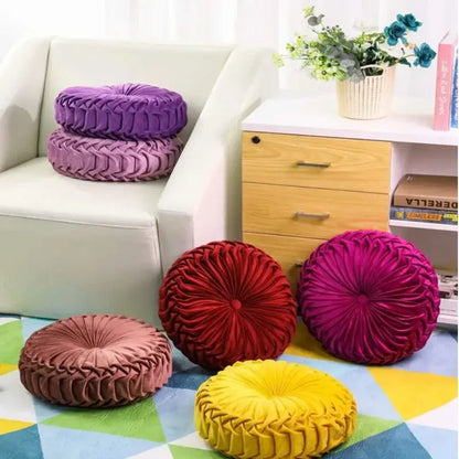 Yellow pleated velvet round throw pillow with plush design and central button detail for elegant living room decorbites throw pillow