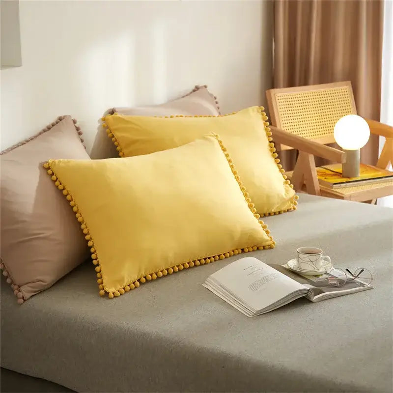 Yellow quilted furball tasseles bedding set pillow with soft plush fabric and decorative pom pom trim for bedroom decorbites furball tasseles