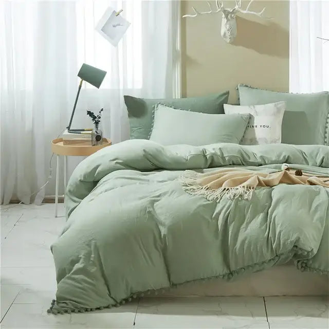 Mint green quilted duvet bedding set with soft tassel trim from decorbites furball tasseles bedding collection