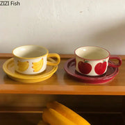 A yellow and red fruits pattern porcelain coffee mug set with ceramic cups and matching plates for dining room decorbites fruits pattern