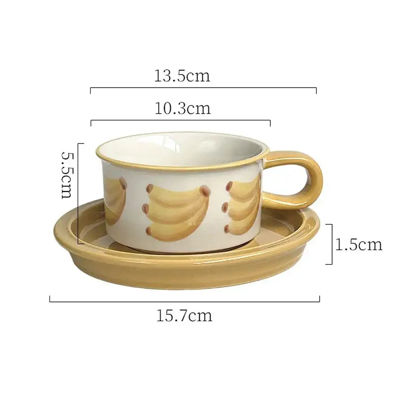 A charming yellow ceramic coffee cup with a banana fruits pattern on a matching saucer for decorbites fruits pattern porcelain set