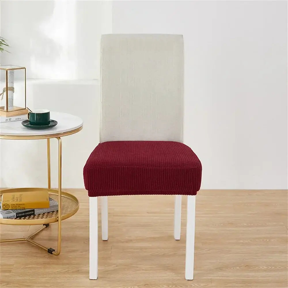 Red corduroy chair cover with textured ribbed surface designed as a fleece chair cover for seat protection