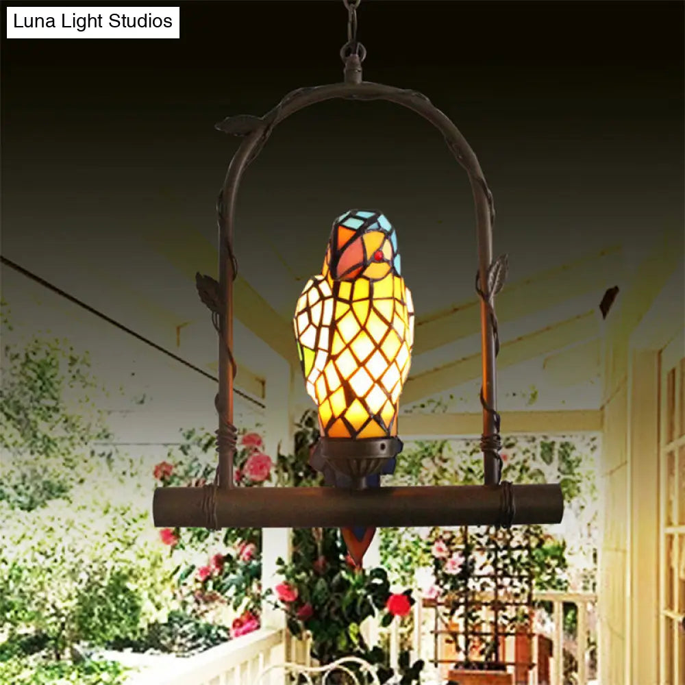 Yellow Stained Glass Victorian Parrot Wall Light with Swing - Mediterranean Style, 1-Light Sconce