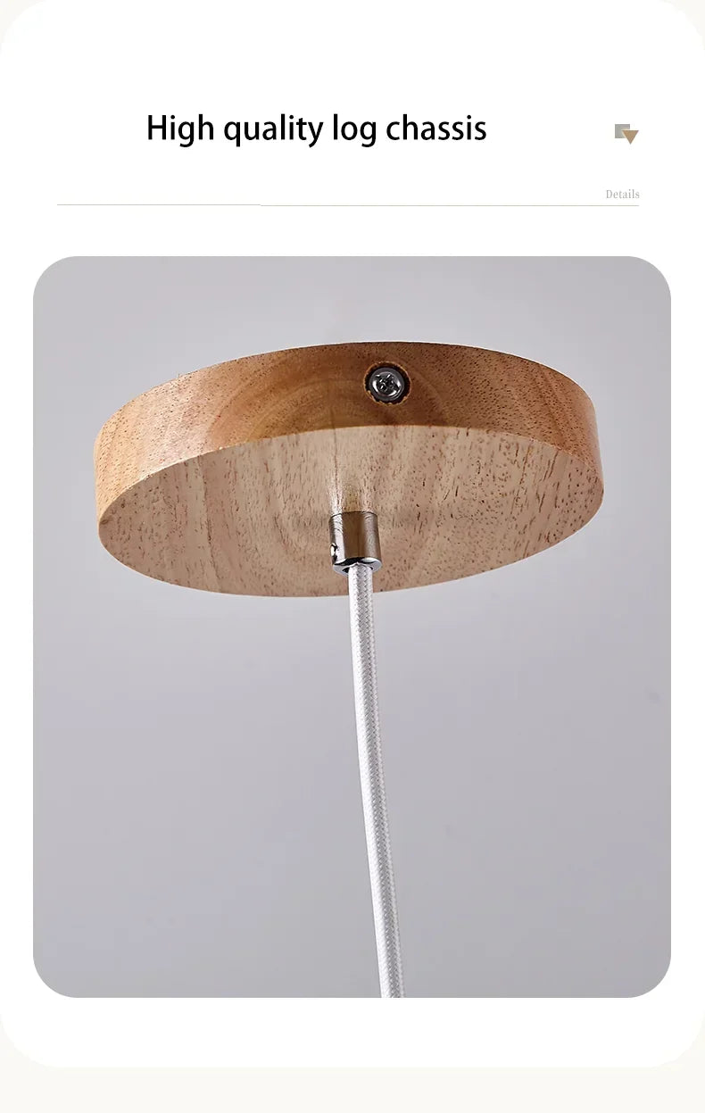 Yellow stone pendant light with circular natural wood ceiling mount and silver braided cable for bedroom use
