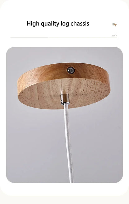 Yellow stone pendant light with circular natural wood ceiling mount and silver braided cable for bedroom use