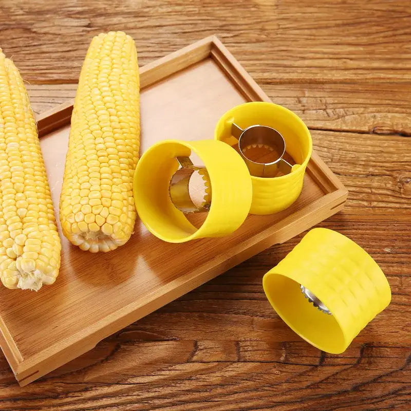 Yellow silicone corn peeler tool with stainless steel cutting mechanism and textured grip for kitchen kernel removal decorbites corn peeler